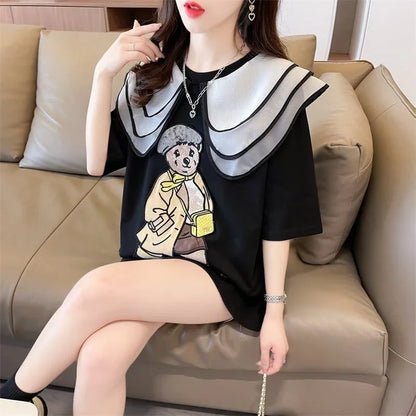 カレッジスタイルのゆったりとしたウエスタンスタイルのネイビーカラー漫画柄Tシャ<U-2897>