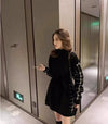 レイヤード風ハイネックロングニットセーター