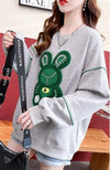 【秋の初めの割引！！】韓国風ルーズ漫画刺繍ホットダイヤモンドミドル丈トップス<U-5024>
